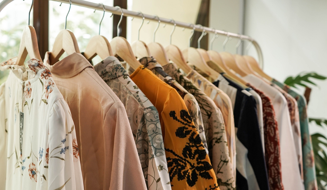 Clothes Hanging on Rack